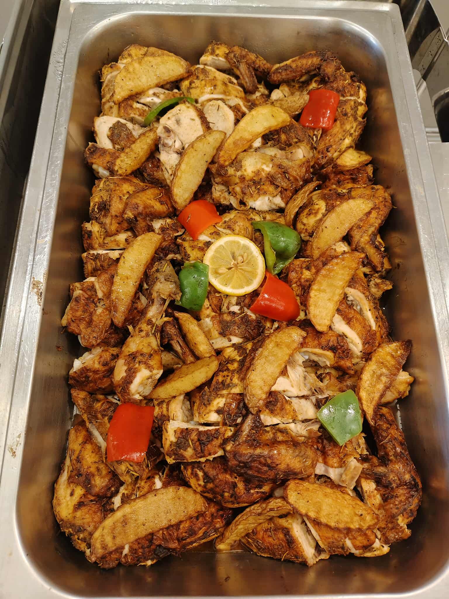 Herb roasted chicken with potato wedges